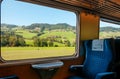 Swiss rural farmland through train window, Train travel concept Royalty Free Stock Photo