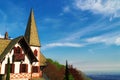 Swiss-style house in the Alpine mountains. Royalty Free Stock Photo