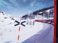 Red Glacier Express on white snow