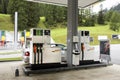 Swiss and traveler people fill oil to tank of car in petrol station Royalty Free Stock Photo