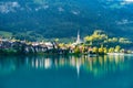 Swiss village Lungern on lake Lungerersee with traditional houses and old church Royalty Free Stock Photo