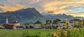 Swiss village sunset with Aps in the background