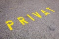 Yellow road marking indicating a private parking spot or entrance Royalty Free Stock Photo