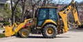 Swissvale, Pennsylvania, USA April 2, 2023 A Caterpillar 420F backhoe parked in a parking lot