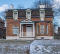 Swissvale, Pennsylvania, USA January 14, 2024 An old two story, brick house on Church Street Royalty Free Stock Photo