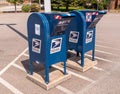 Swissvale, Pennsylvania, USA 8/23/20 Two United States Postal Service mailboxes in a parking lot