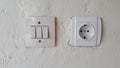 Switch and Electric socket and white wall Switch and Electric socket and white wall. Royalty Free Stock Photo