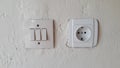 Switch and Electric socket and white wall Switch and Electric socket and white wall. Royalty Free Stock Photo