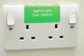 Save energy sign on plug sockets