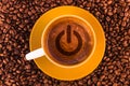 Switch on-off symbol on fresh espresso with a beautiful crema