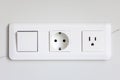 Switch and sockets. White module. Modern wall Royalty Free Stock Photo