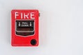Switch to Fire alarm system on white wall background Royalty Free Stock Photo