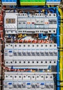 Voltage distributor with automatic switches. Electrical background.
