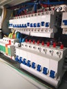 Switchboard with many switches and cables. Power shield lighting. electric connection wires of fuse switch box. Mobile photo