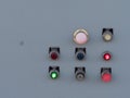 Switches and toggles on a control panel flashing various lights Royalty Free Stock Photo
