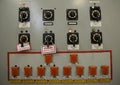 Switches toggles tumblers of switching electricity on the main control board in a control operations room of the reactor