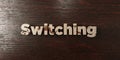 Switching - grungy wooden headline on Maple - 3D rendered royalty free stock image