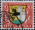 Switzerland - Circa 1930: a postage stamp printed in the Switzerland showing the coat of arms of the city of Schaffhausen in Switz Royalty Free Stock Photo