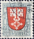 Switzerland - Circa 1919: a postage stamp printed in the Switzerland showing a double key on the coat of arms of the Swiss canton Royalty Free Stock Photo