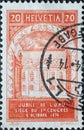 Switzerland - Circa 1924: a postage stamp printed in the Switzerland showing the historic building of the world post association o