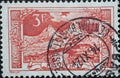 Switzerland - Circa 1915 : a postage stamp printed in the Switzerland showing a landscape with mountains and myths in the foregrou