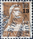 Switzerland - Circa 1921 : a postage stamp printed in the Switzerland showing the Swiss national hero: Wilhelm Tell with a full be