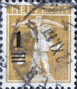 Switzerland - Circa 1930 : a postage stamp printed in the Switzerland showing Wilhelm Tell`s son Tell boy with a crossbow and a