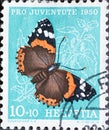 Switzerland - Circa 1950: a postage stamp printed in the swiss showing the admiral butterfly Vanessa atalanta on nettle