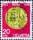 Switzerland - Circa 1962 : a postage stamp printed in the swiss showing an ancient coin. Gold Ducat Schwyz Federal Celebration Tex