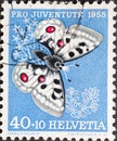 Switzerland - Circa 1955 : a postage stamp printed in the swiss showing the butterfly Apollo butterfly Parnassius apollo on sax