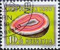 Switzerland - Circa 1959 a postage stamp printed in the swiss showing an orange agate geode. Federal celebration Text: Pro Patria