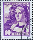 Switzerland - Circa 1933 : a postage stamp printed in the swiss showing the portrait of a Bernese woman in historical costume and