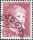 Switzerland - Circa 1952 : a postage stamp printed in the swiss showing a portrait drawing of a boy by Albert Anker
