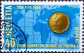 Switzerland - Circa 1954 : a postage stamp printed in the swiss showing a soccer ball and world map Soccer World Cup 1954 in Laus