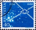 Switzerland - Circa 1952 : a postage stamp printed in the swiss showing a symbol of 100 years of electrical communications in Swit