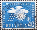 Switzerland - Circa 1957 : a postage stamp printed in the swiss showing World Meteorological Organization OMM / WMO Weather elem