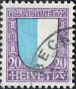 Switzerland - Circa 1922: a postage stamp printed in the Switzerland showing a blue and white coat of arms of the Swiss canton of