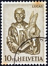 SWITZERLAND - CIRCA 1961: A stamp printed in Switzerland shows apostle Luke, circa 1961.