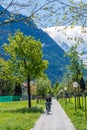 Switzerland, enjoying the sun riding a bicycle and a stunning view