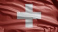 Switzerland flag waving in the wind. Close up of Swiss banner blowing soft silk
