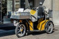 Switzerland, Geneva - June 2015. Swiss post delivery motorcycle on the street in the city center of Geneva. Swiss post is a public Royalty Free Stock Photo