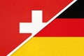 Switzerland and Germany, symbol of national flags from textile. Championship between two countries