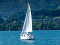 Switzerland, Interlaken, August 16,2009: A yacht speeds across the lake in Interlaken