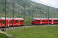 Switzerland: July 2012, Red Alpine Train Bernina Express from St.Moritz to Tirano near Bernina Pass in Switzerland