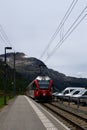 Red train from the UNESCO-listed Rhaetian Railway from Italy to Switzerland