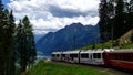 Red train from the UNESCO-listed Rhaetian Railway from Italy to Switzerland