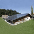 Switzerland: Solar energy panel on the roof of a farmhouse