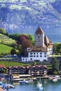 Switzerland travel. Scenic lake Thun and the Spiez village and castle