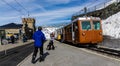 Switzerland, Zermatt - April- 7, 2019 :The Zermatt, Switzerland as rack railway and Gornergrat orange tourist trainunder