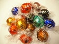 SWITZERLAND ZURICH, SEPTEMBER 2017: Chocolate candies Lindt Lindor. Candy in multi-colored wraps Royalty Free Stock Photo